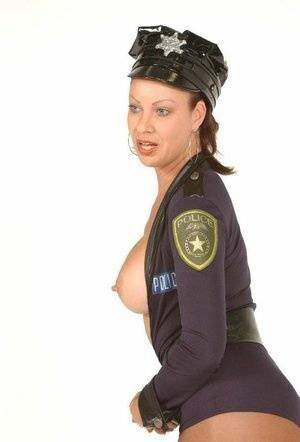 Playful MILF Vanessa Videl wears her slutty police uniform and shows off her on galpictures.com