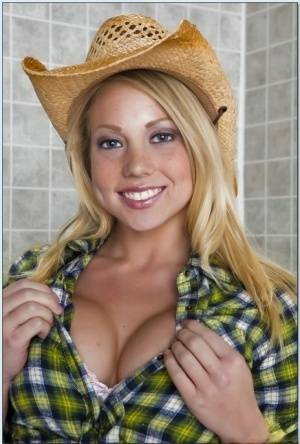 Blond teen babe in a cowboy hat Shawna Lenee goes nude in the shower on galpictures.com