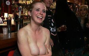White girl has her asshole penetrated while being gangbanged in a bar on galpictures.com