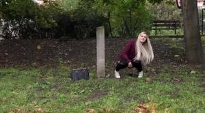 Dirty blonde female can't hold her pee any longer and pisses in public park on galpictures.com