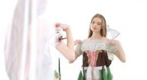 Young beauty Adel Bye dresses in an Oktoberfest outfit to greet her boyfriend on galpictures.com