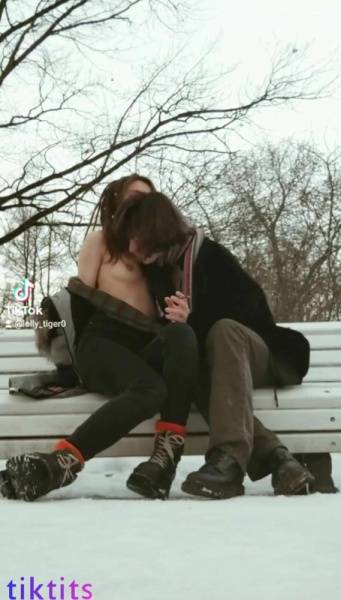 Two underage 18+ TikTok girls have fun in a snowy park and suck each other's virgin nipples nsfw on galpictures.com