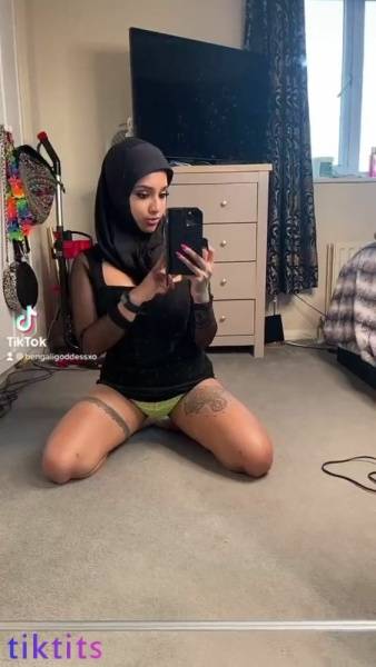 Naughty Muslim woman 18+ gets naked in front of the mirror and jumps on a fat dildo for tiktok porn on galpictures.com