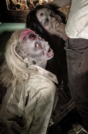 Fetish models Brittany Lynn and Jessie Lee giving head in Zombie threesome on galpictures.com