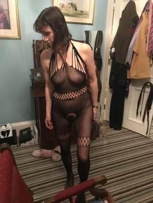 Older amateur Slut Scot Susan shows her beaver on a bed in a bodystocking - Scotland on galpictures.com