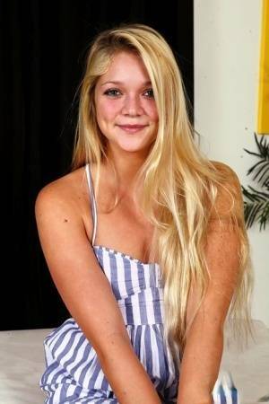 Young blonde Jessie Andrews is all aglow after a fuck and open mouth facial on galpictures.com