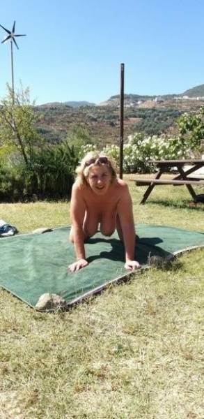 Mature amateur sports a creampie after sex atop a picnic table on galpictures.com