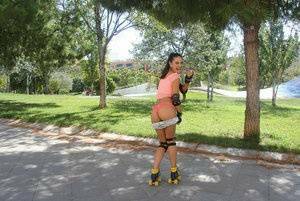 Latina solo girl Carolina Abril shedding shorts to expose nice ass outdoors on galpictures.com