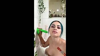 Jewelz Blu sucking a neon green dildo in the tub onlyfans porn videos on galpictures.com