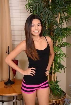 Sweet Latina teen Serena Torres pleases her bald snatch with a vibrator on galpictures.com