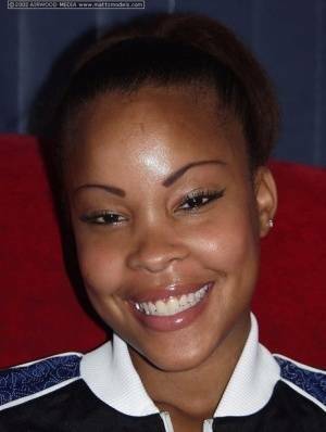Black amateur Candice flashes a nice smile before baring her great body on galpictures.com