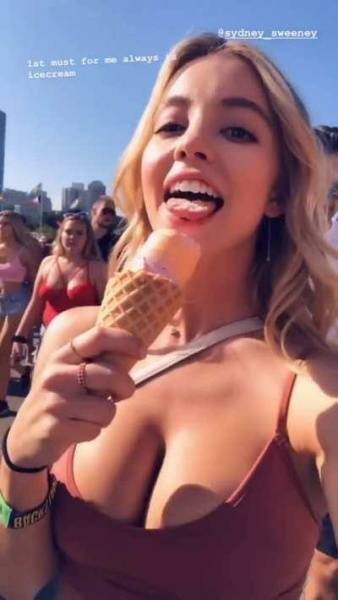 Sydney Sweeney Being Tease by Showing her Licking Skills. She's Drop Dead Gorgeous, her Incredible Rack is Just Unavoidable. on galpictures.com