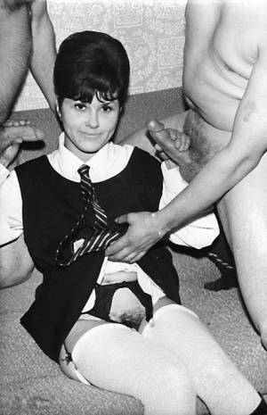 Small titted vintage schoolgirl removes her uniform for a big cock threesome on galpictures.com