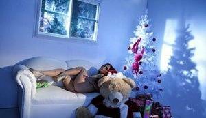 Hot girl Natasha Nice masturbates with a vibrator while alone at Christmas on galpictures.com